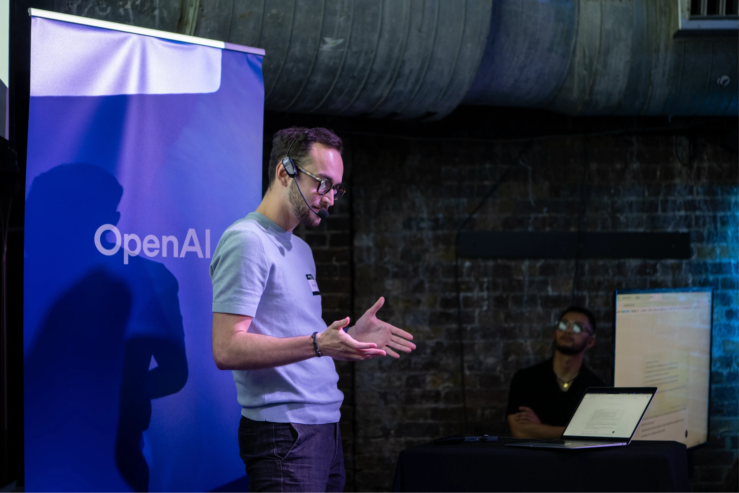 Presenting OSCAR on stage at the Vercel and OpenAI hackathon